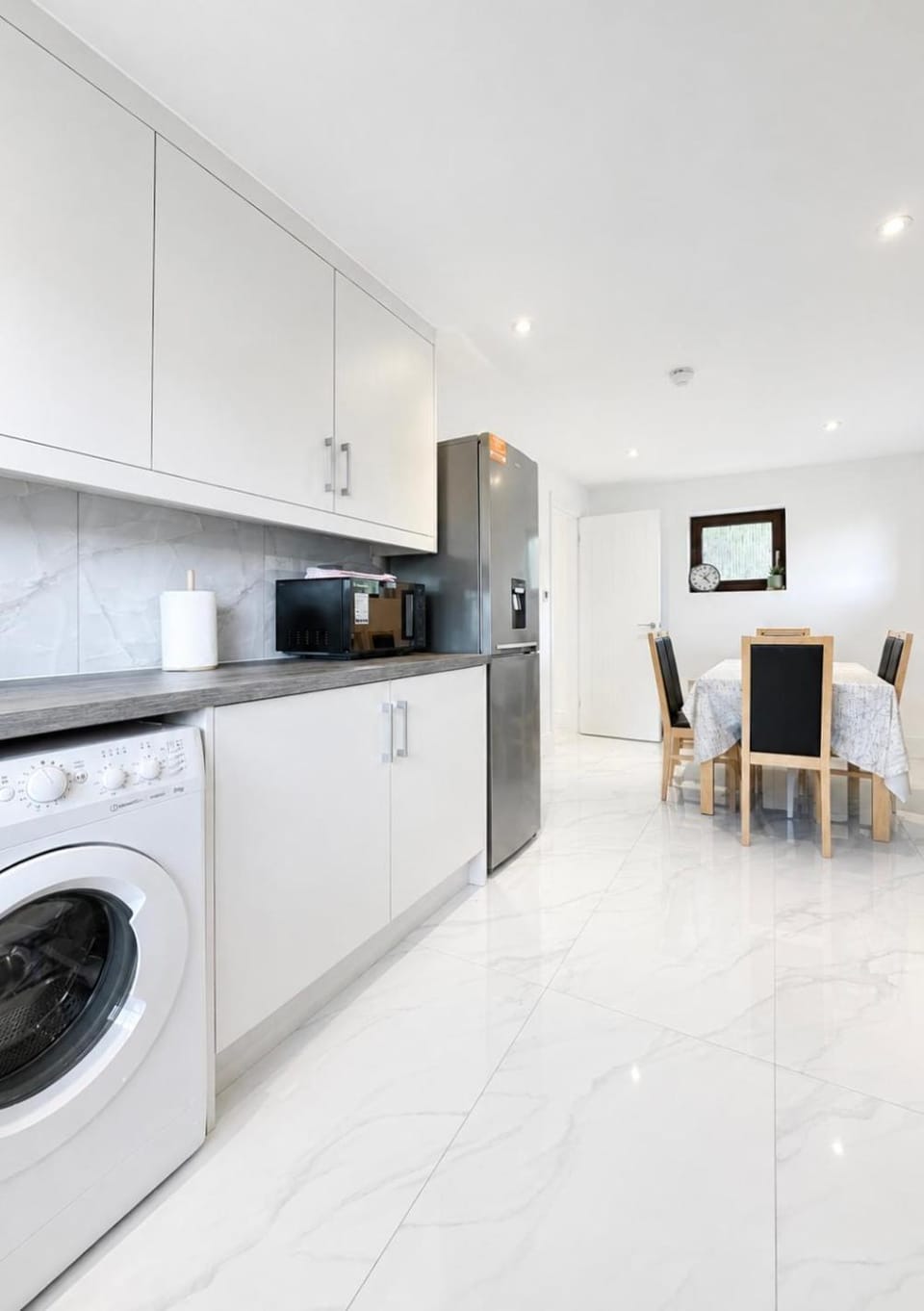 Kitchen or kitchenette, Dining area, dishwasher, oven, stove, washing machine