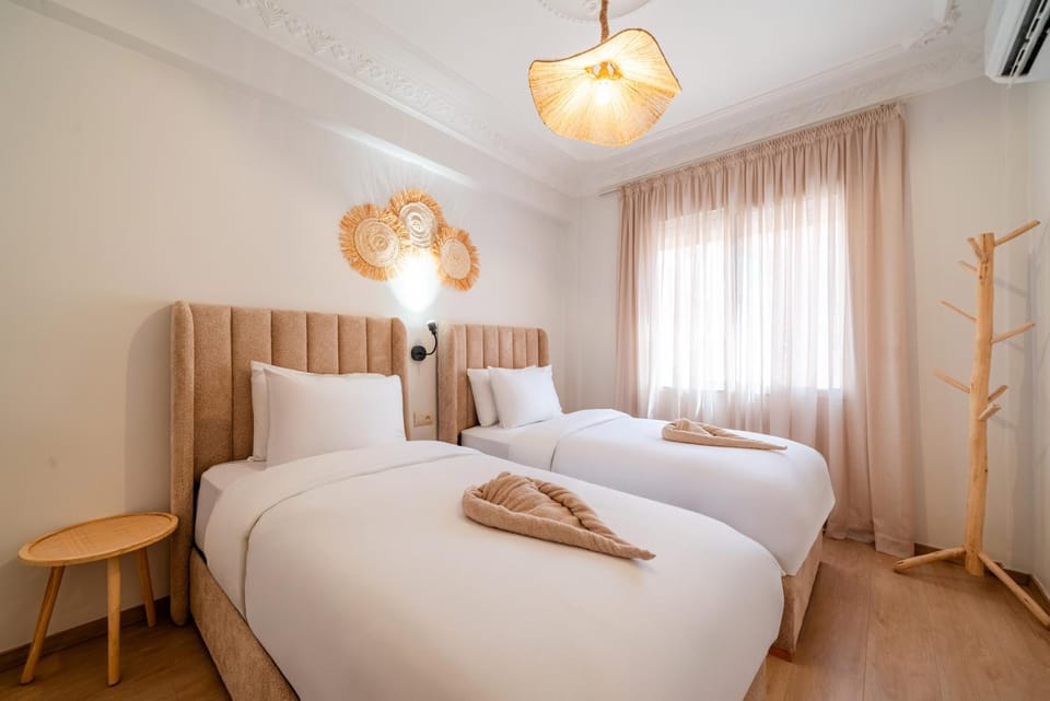 Bed, Photo of the whole room, Bedroom, towels, air conditioner