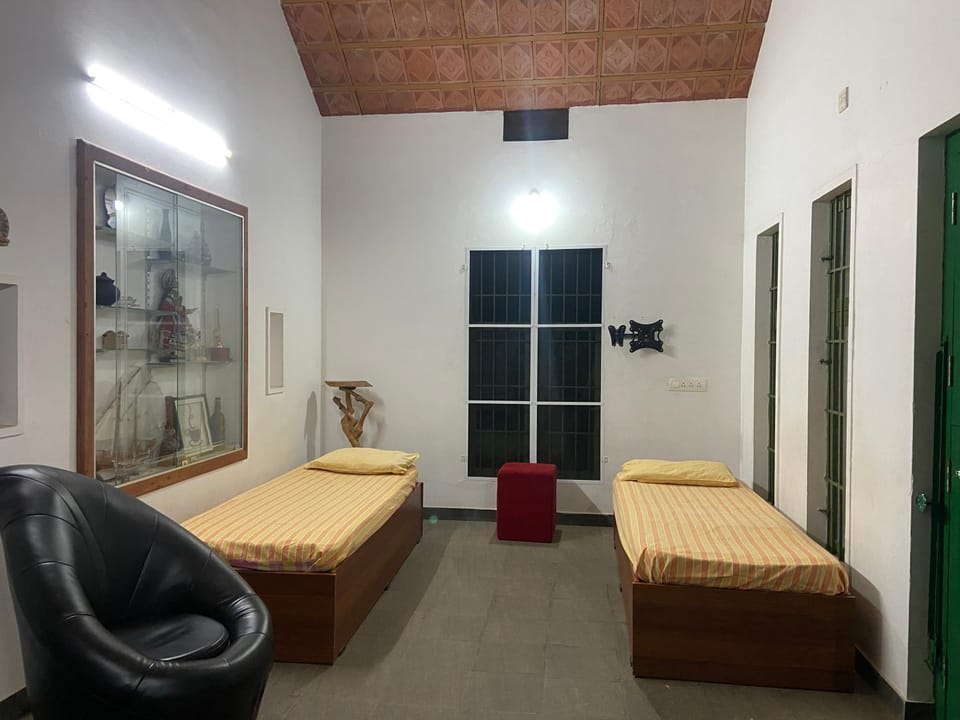 Solitude Riverside Red house House in Kerala
