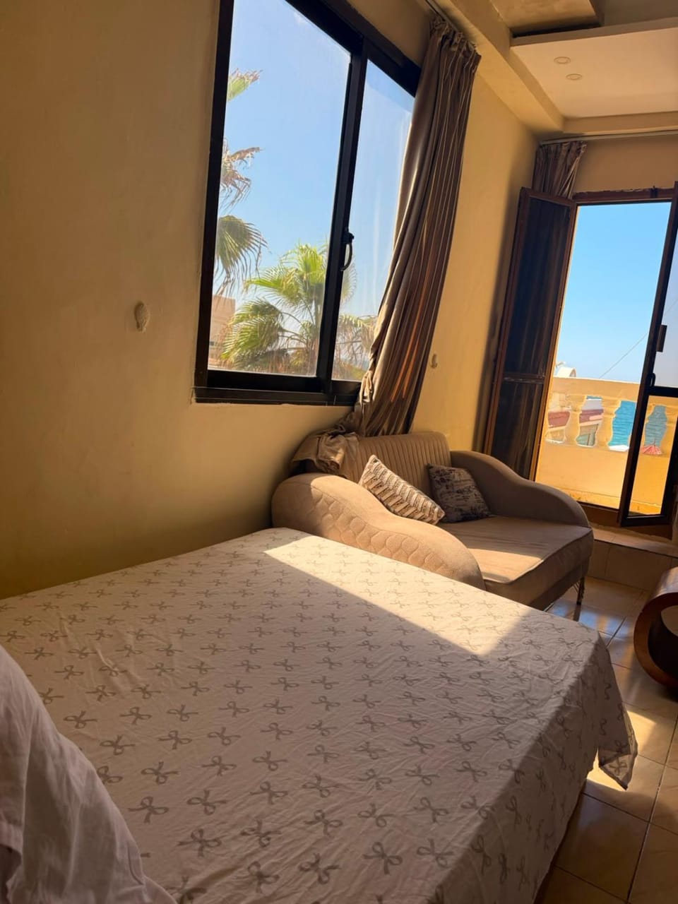 Bed, Living room, Seating area, Bedroom