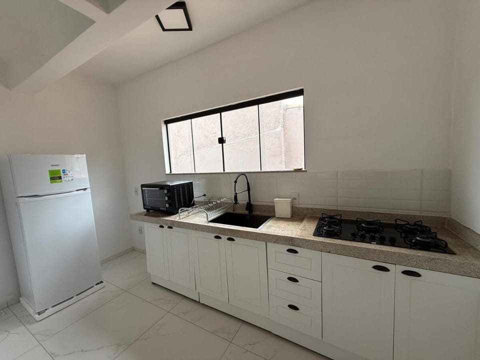 Kitchen or kitchenette, oven, stove