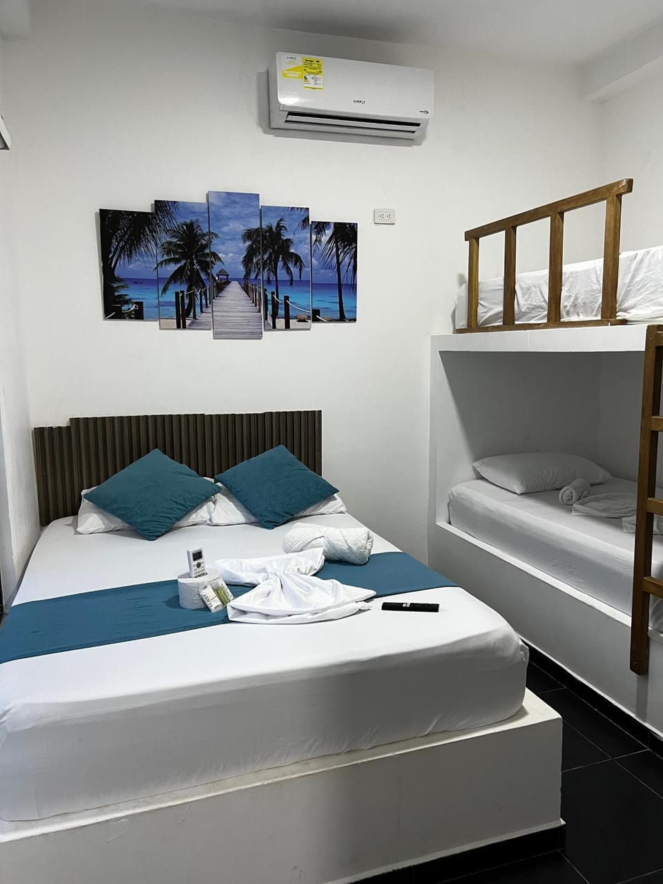 Bed, Photo of the whole room, Bedroom, bunk bed, towels, air conditioner