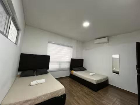 Suite céntrica 2 camas matrimoniales Smart TV Apartment in Monterrey