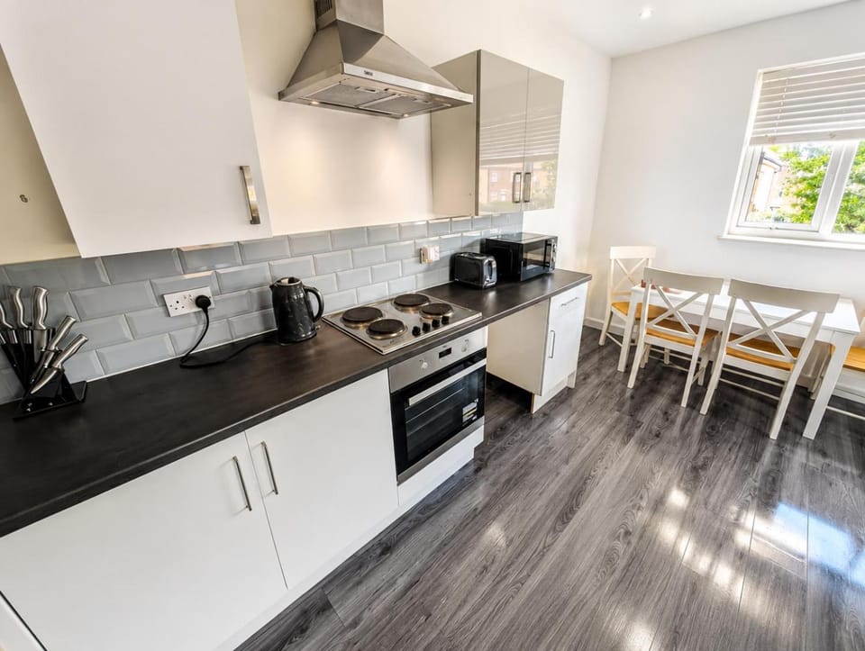 Kitchen or kitchenette, Dining area, oven, stove, toaster