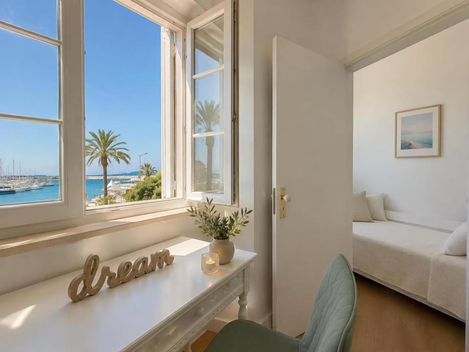 Bed, Natural landscape, Seating area, Bedroom, Sea view