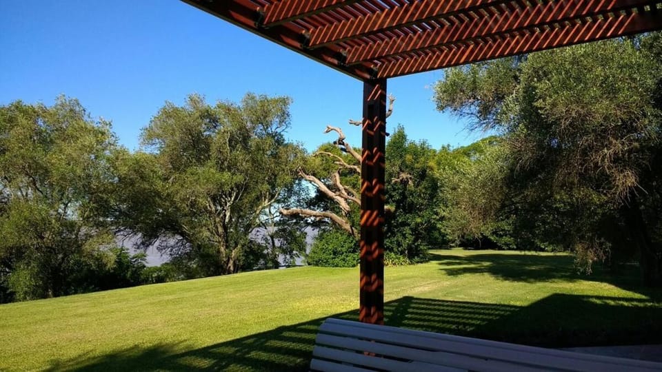 Country house facing the river with tennis court House in Entre Ríos Province, Argentina