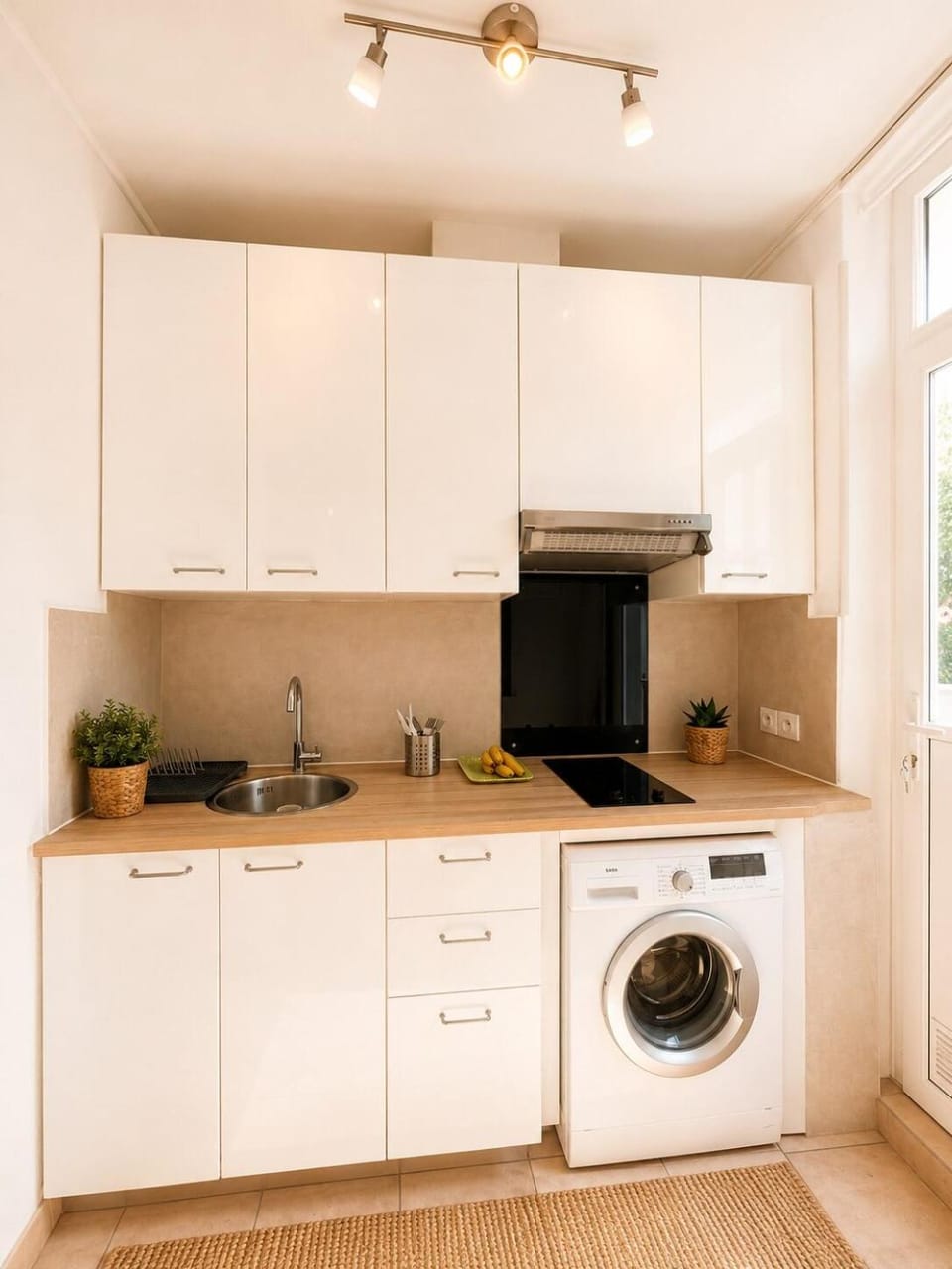 Kitchen or kitchenette, stove, washing machine