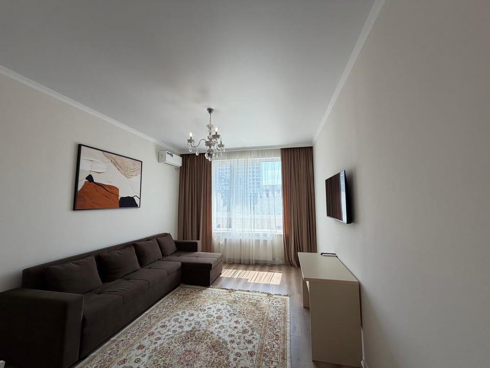 Bed, TV and multimedia, Living room, Seating area