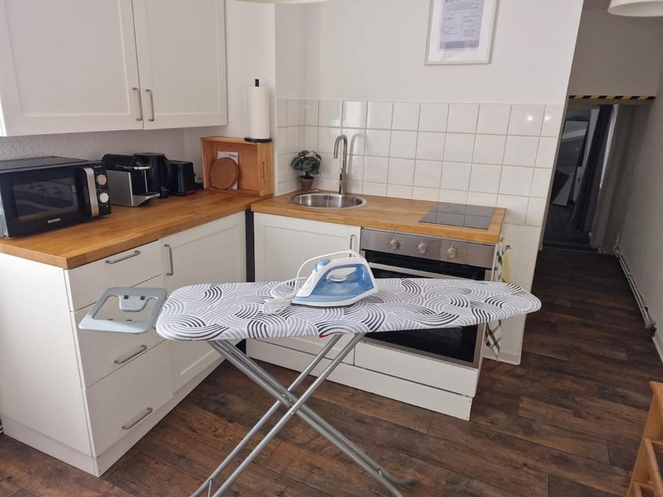Kitchen or kitchenette, oven, stove, toaster