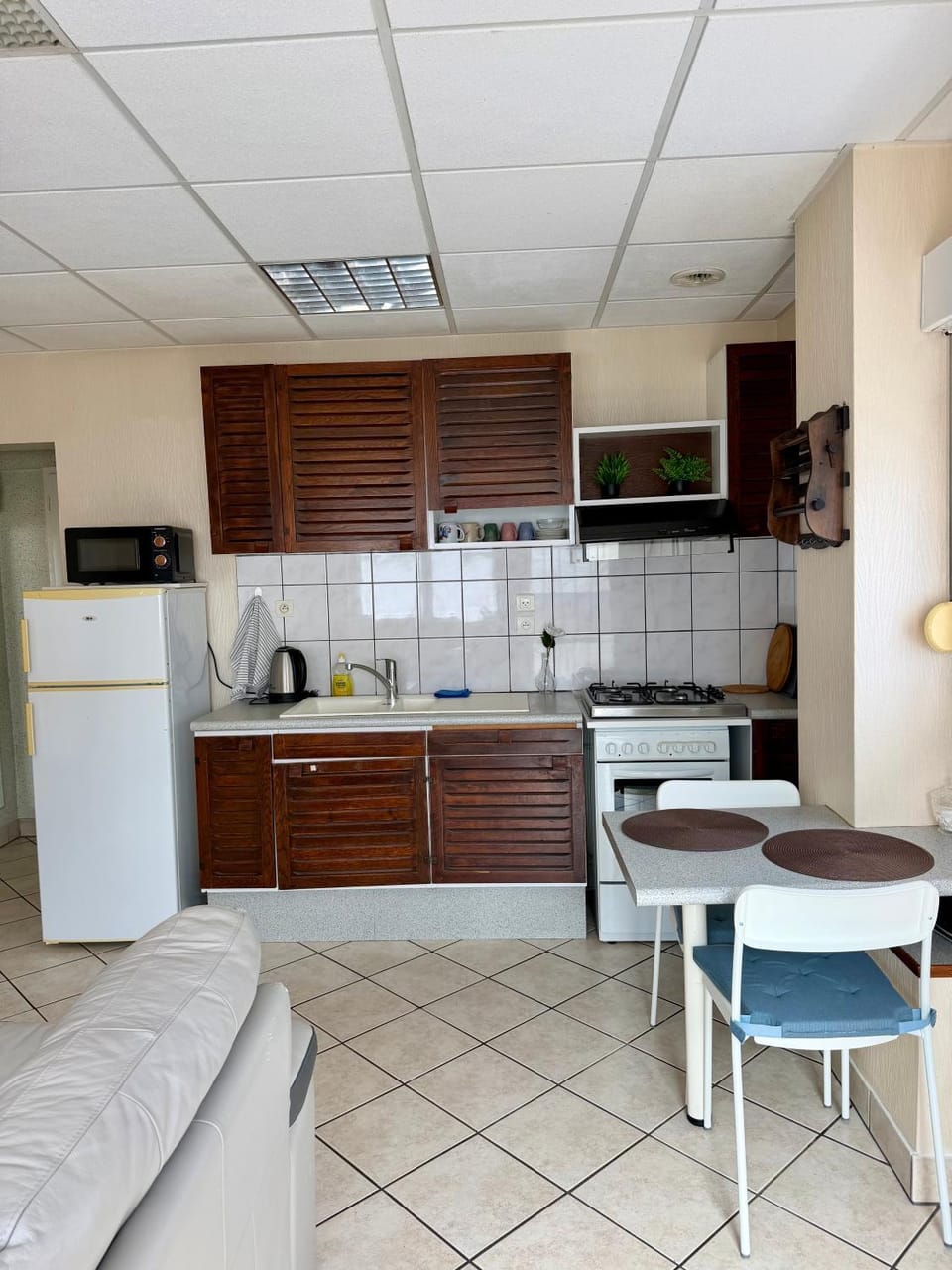 Kitchen or kitchenette, stove, kitchen