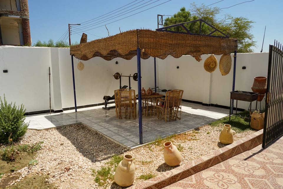 Patio, Day, Dining area