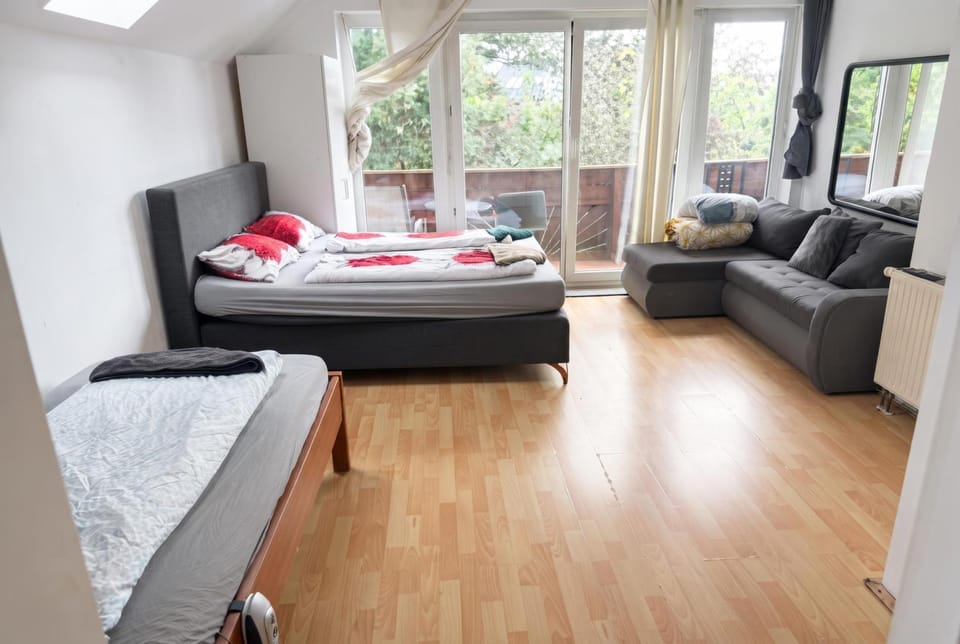 Property building, Bed, Living room, Seating area, Bedroom