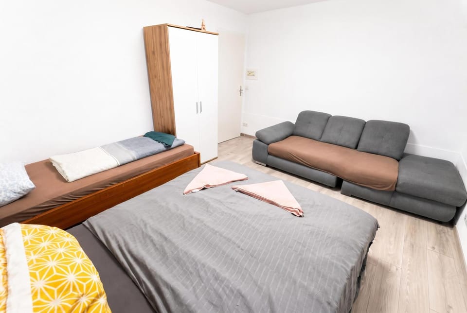 Bed, Living room, Seating area, Bedroom
