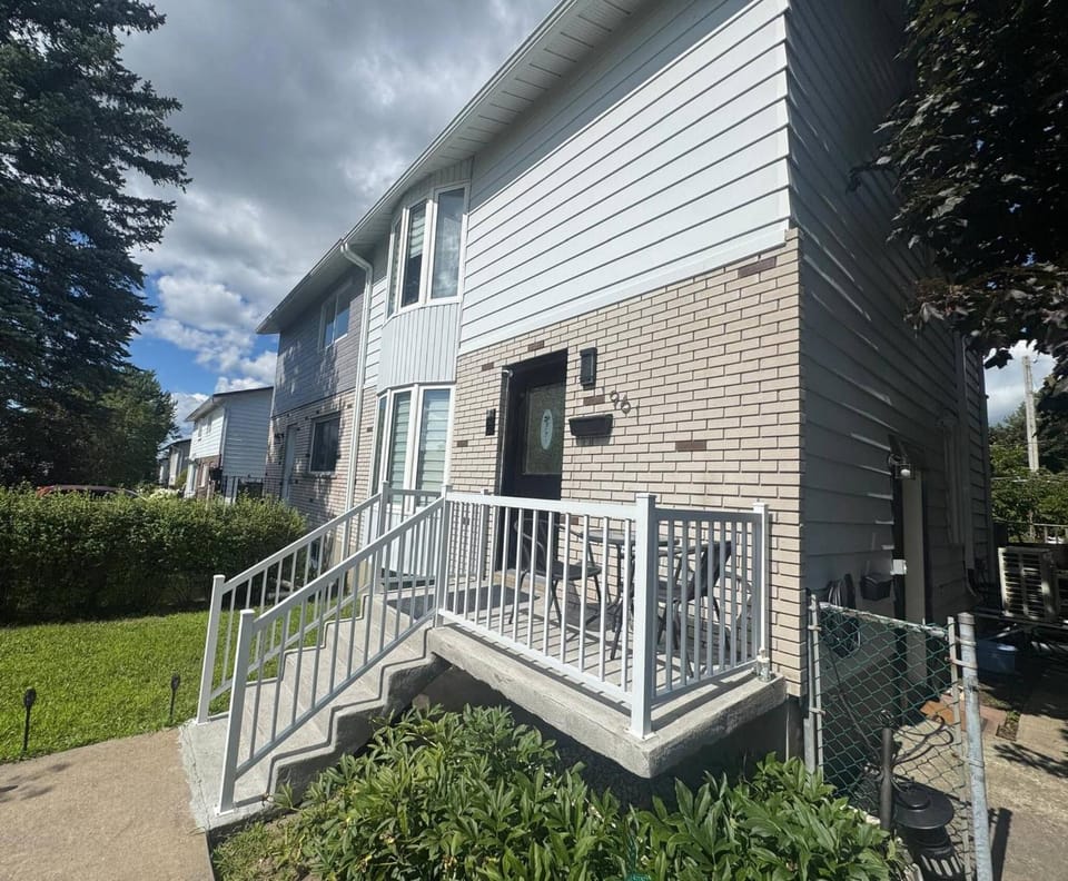 Anika Sunset Place T House in Laval