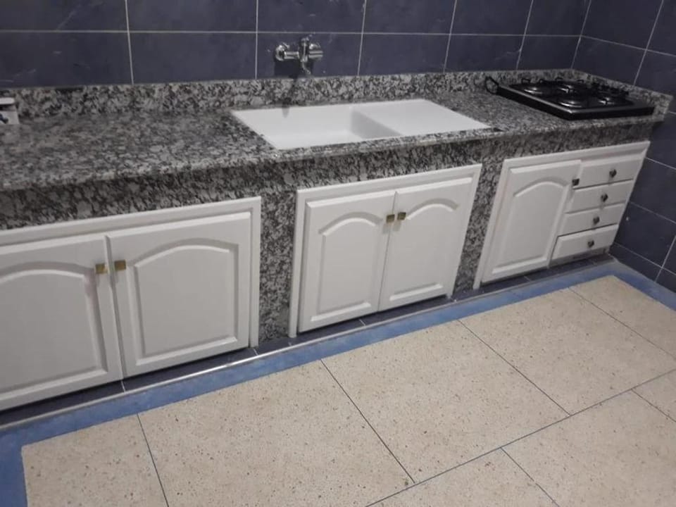 Kitchen or kitchenette, stove