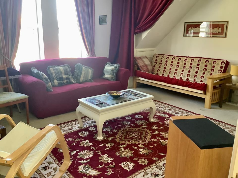 Bed, Living room, Seating area