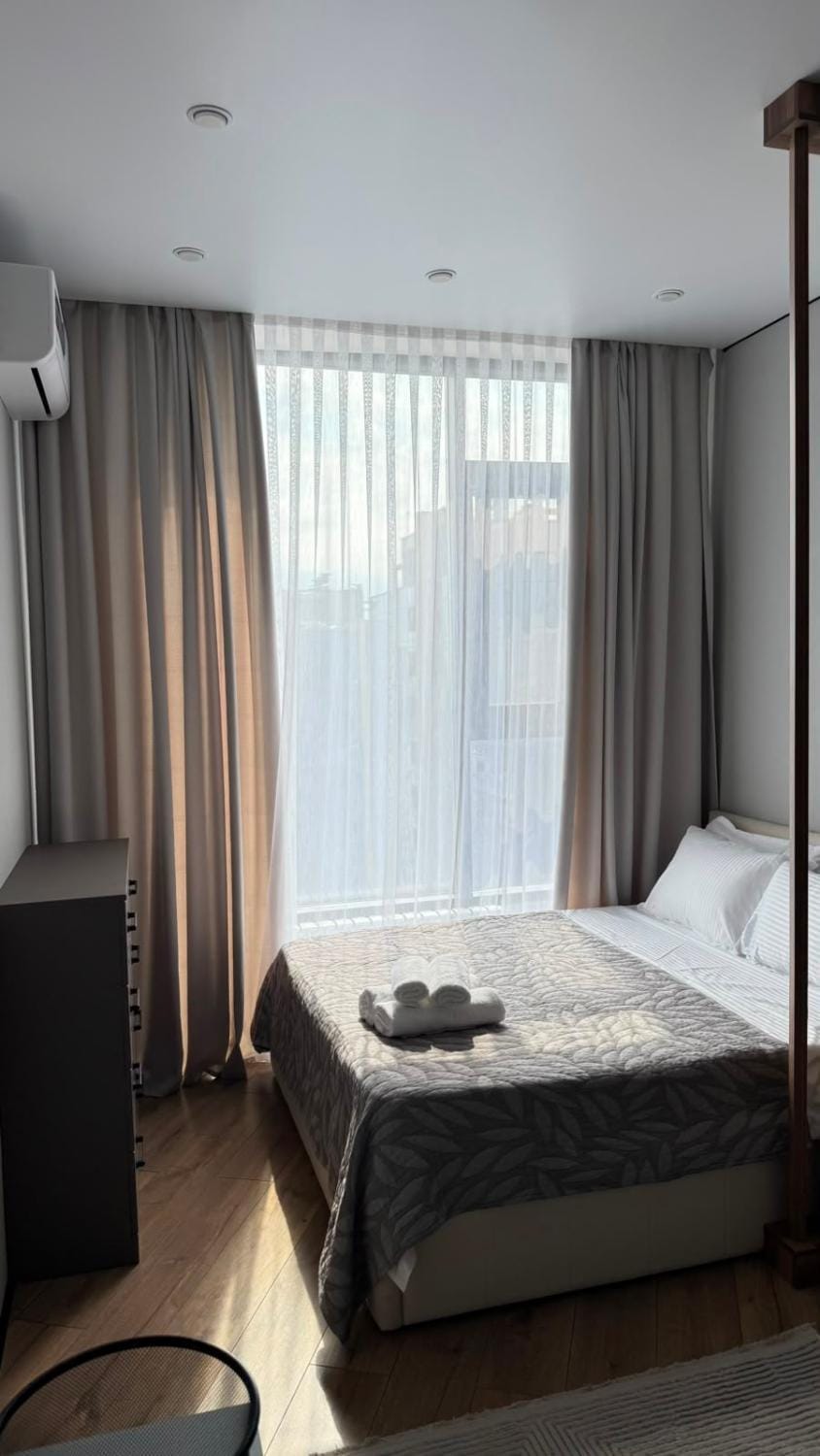 Bed, View (from property/room), Bedroom, City view, Landmark view, towels, wardrobe, air conditioner