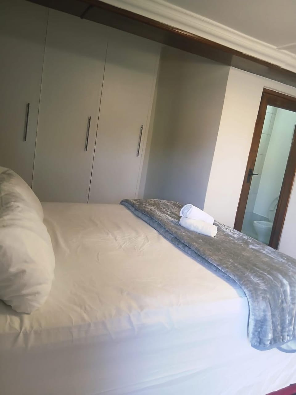 Bedroom, towels, wardrobe