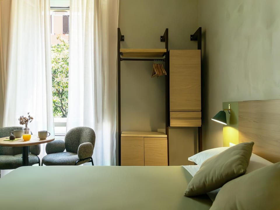 Bed, View (from property/room), Bedroom, City view, locker, wardrobe