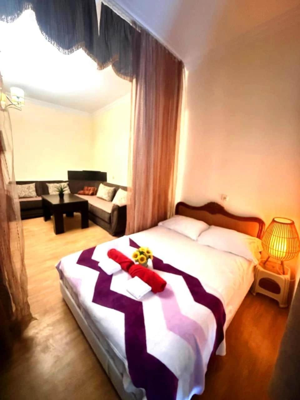 Bed, Living room, Seating area, Bedroom