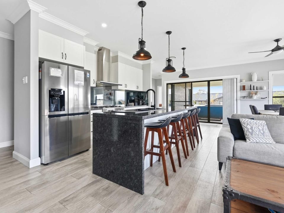 Kitchen or kitchenette, dishwasher, oven, stove, toaster