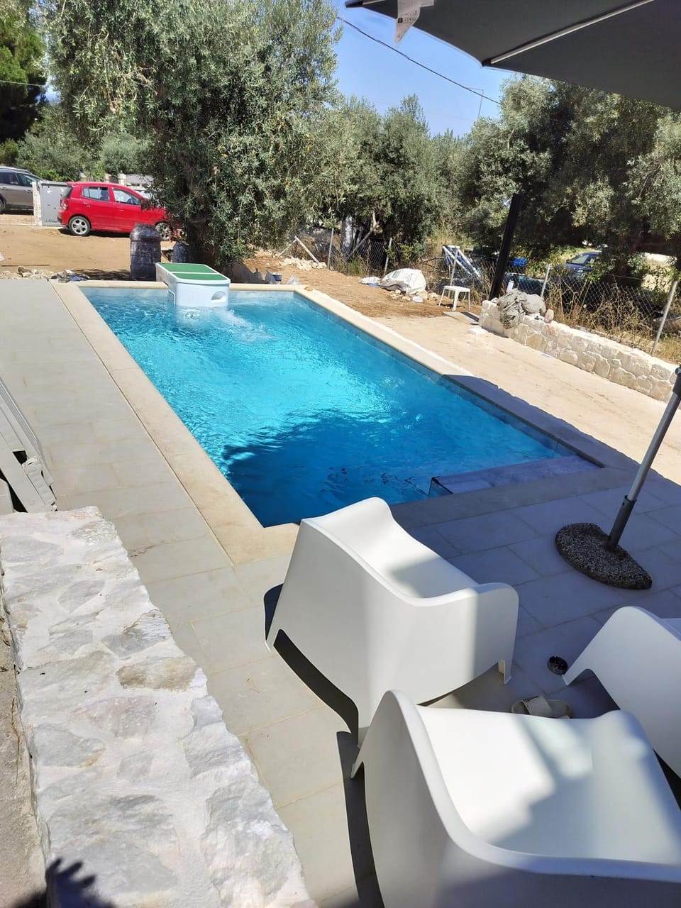 Patio, Day, Pool view, Parking, sunbed