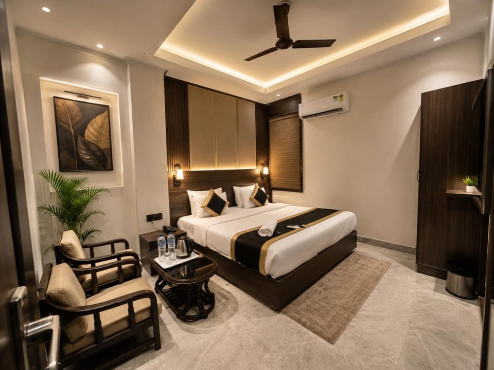 Bed, TV and multimedia, Living room, Photo of the whole room, Seating area, Bedroom, fireplace, towels, wardrobe, air conditioner