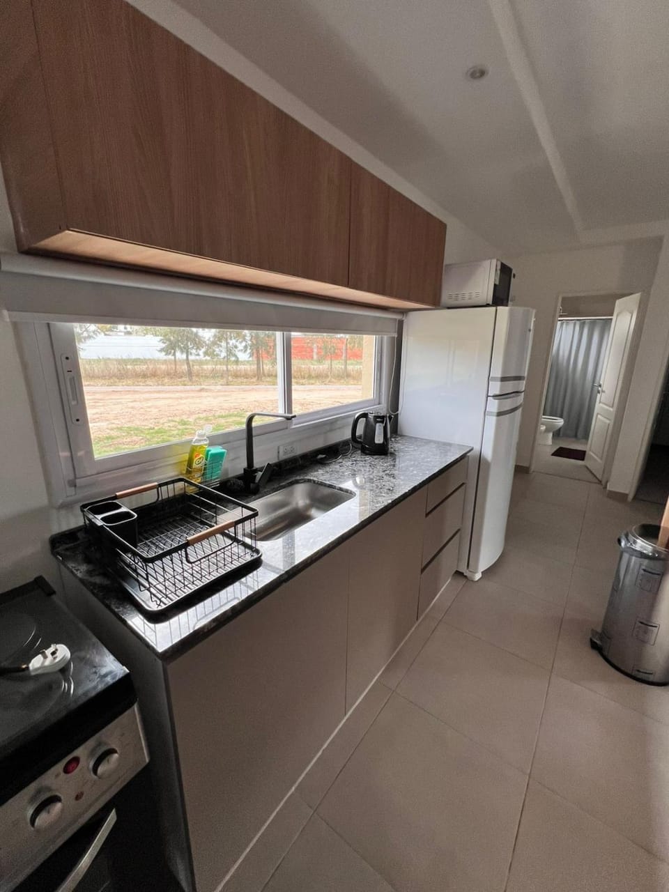 Kitchen or kitchenette, dishwasher, oven, toaster
