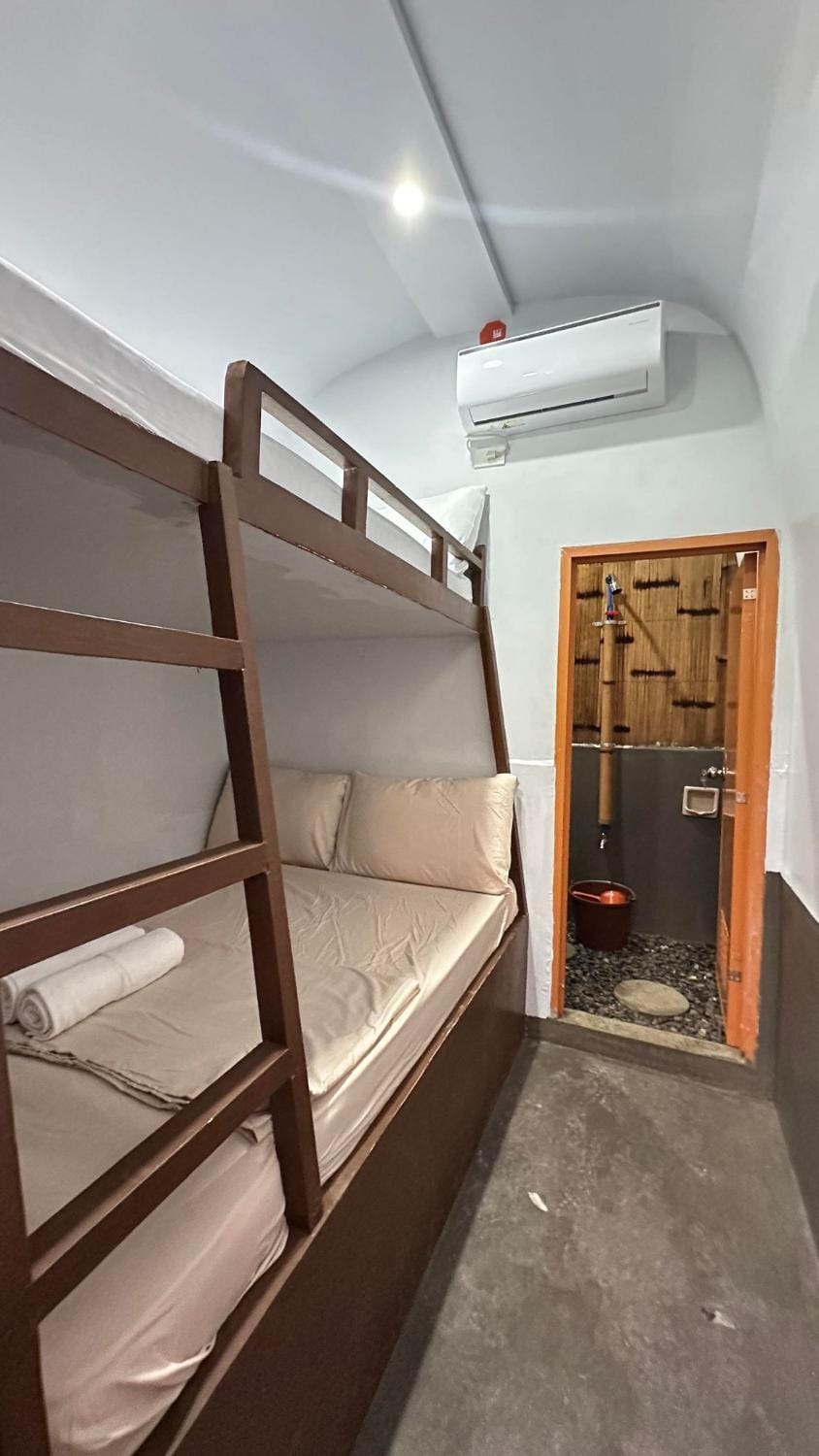 Photo of the whole room, bunk bed, air conditioner