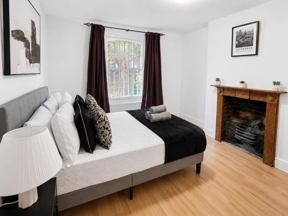 Bed, View (from property/room), Decorative detail, Bedroom, fireplace, flat iron, hair dryier, heating, towels, wardrobe
