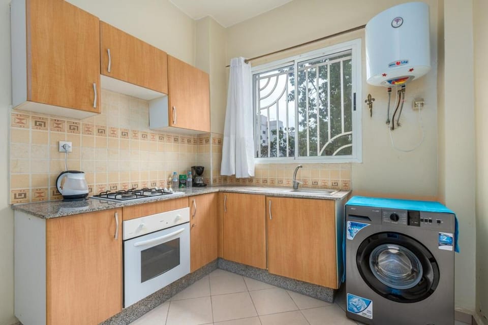 Coffee/tea facilities, oven, stove, washing machine, kitchen