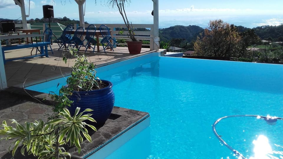 Property building, Living room, Swimming pool