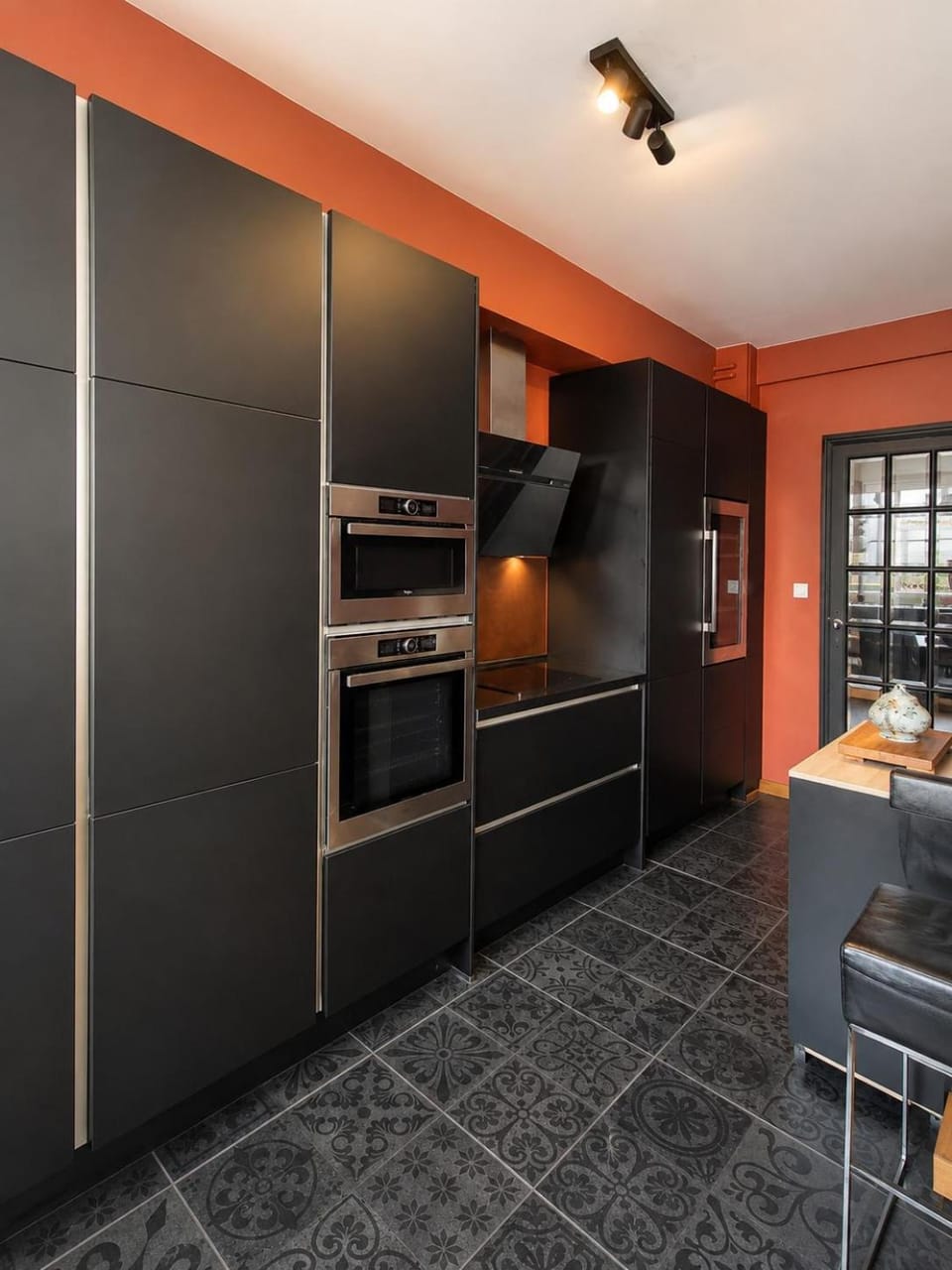 Kitchen or kitchenette, dishwasher, oven, stove