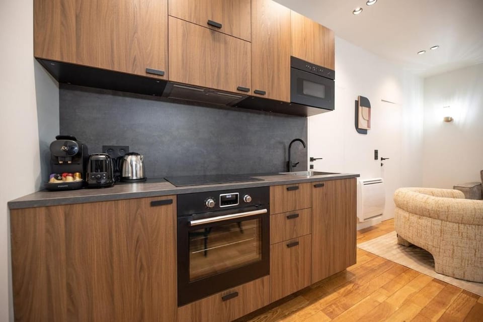 Kitchen or kitchenette, stove, toaster