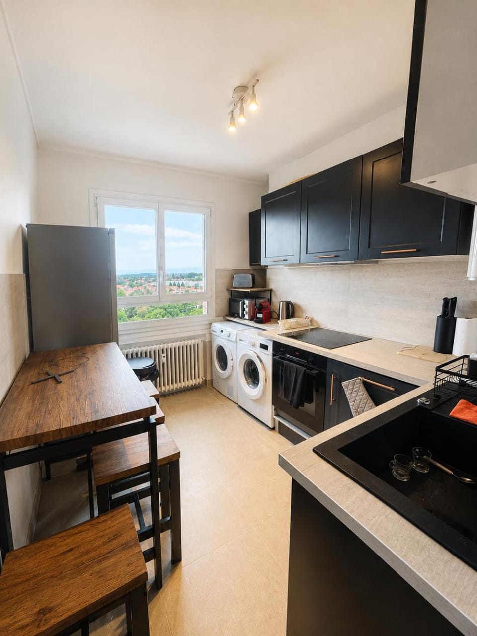Dining area, oven, stove, washing machine, dryer