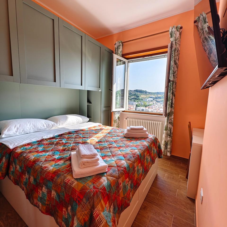 Bed, Natural landscape, TV and multimedia, Bedroom, towels, wardrobe