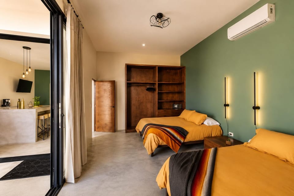 Bed, Kitchen or kitchenette, Seating area