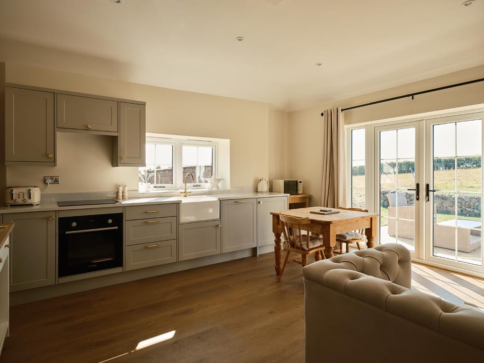 Kitchen or kitchenette, Dining area, dishwasher, stove, toaster