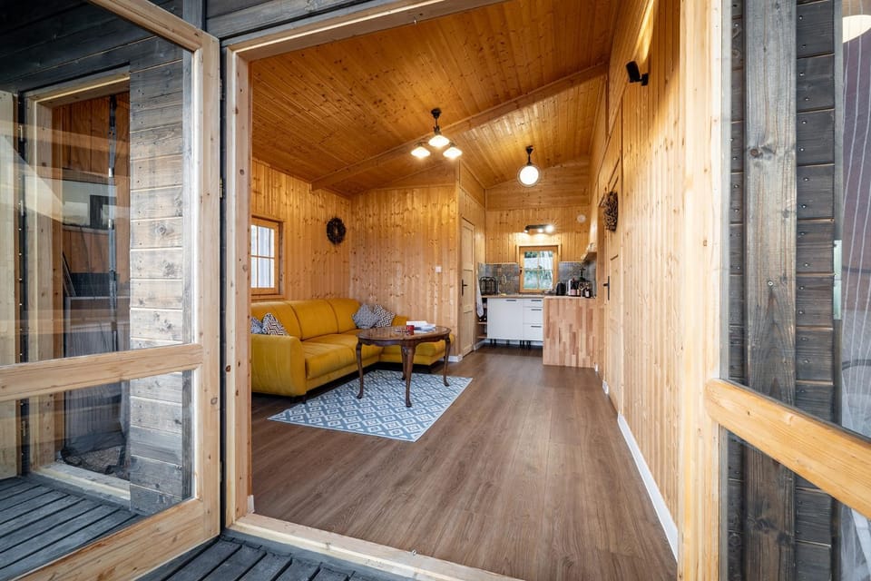 Property building, Kitchen or kitchenette, Living room, Seating area, microwave, kitchen