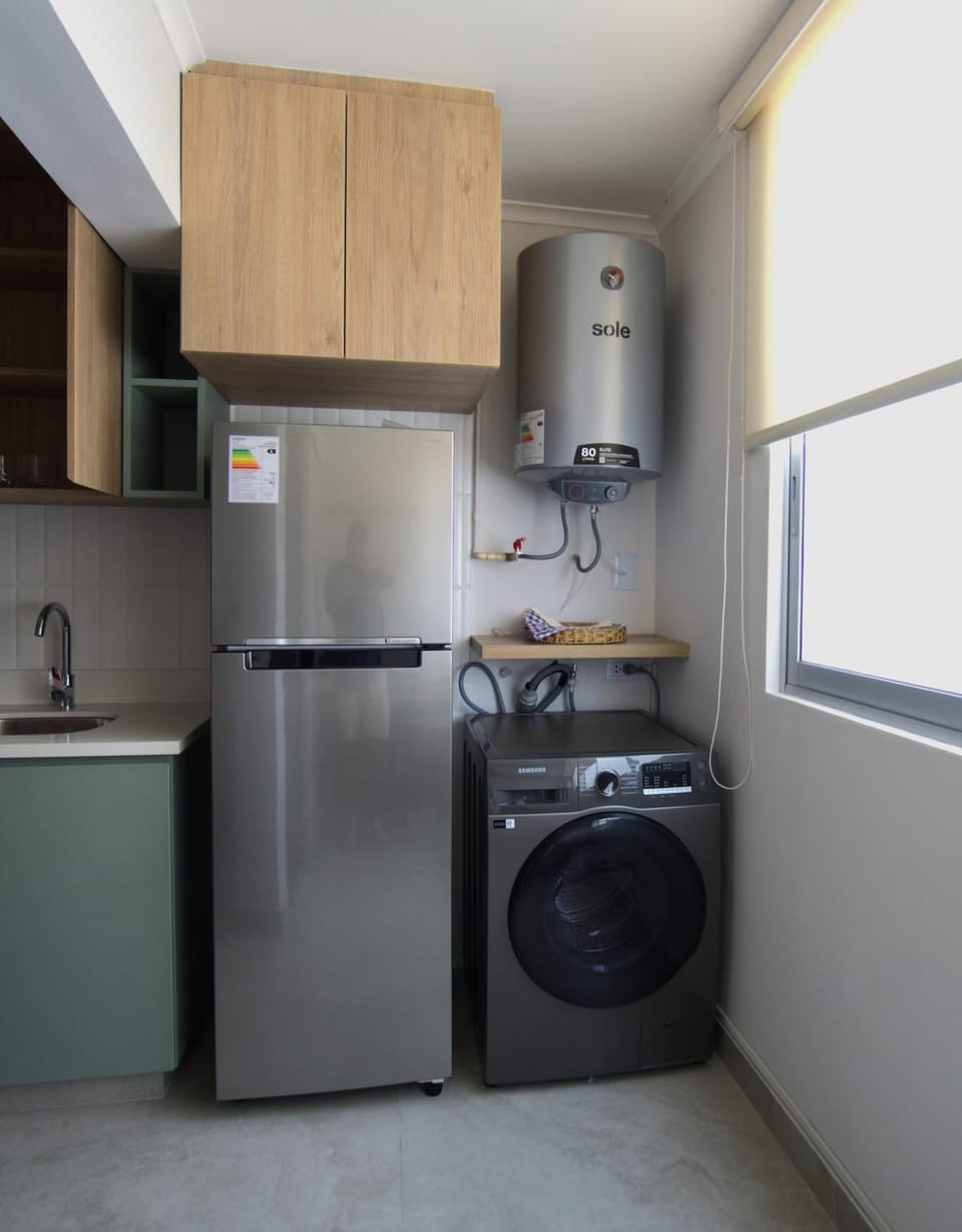 Kitchen or kitchenette, washing machine