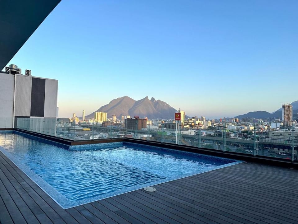 Property building, Nearby landmark, Day, Natural landscape, City view, Mountain view, Pool view, Swimming pool