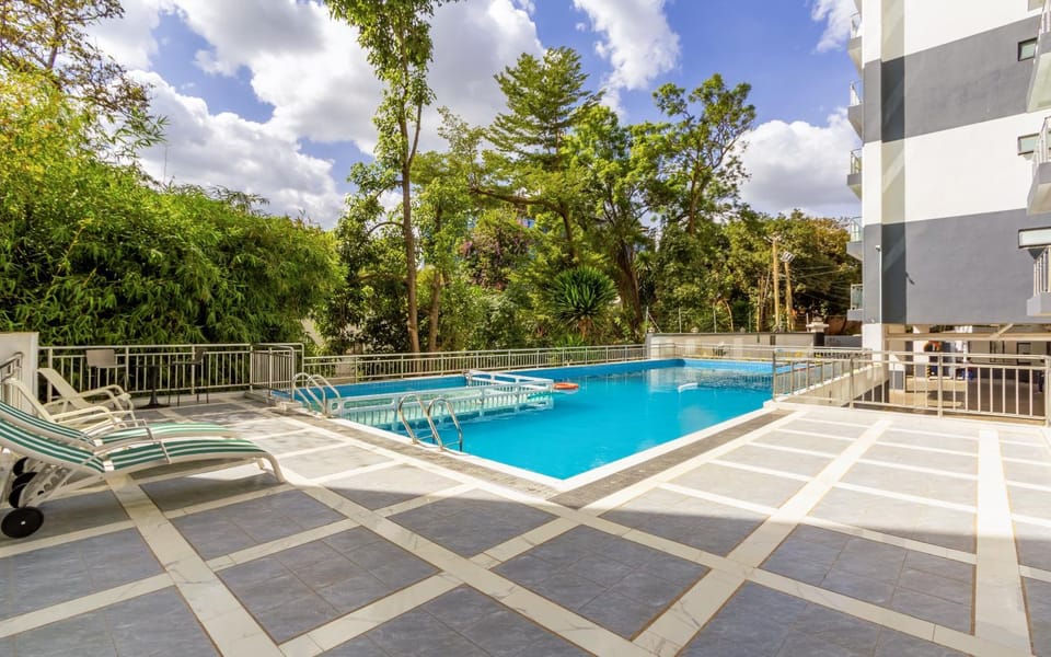 Property building, Spring, Day, Pool view, Swimming pool, Swimming pool, sunbed