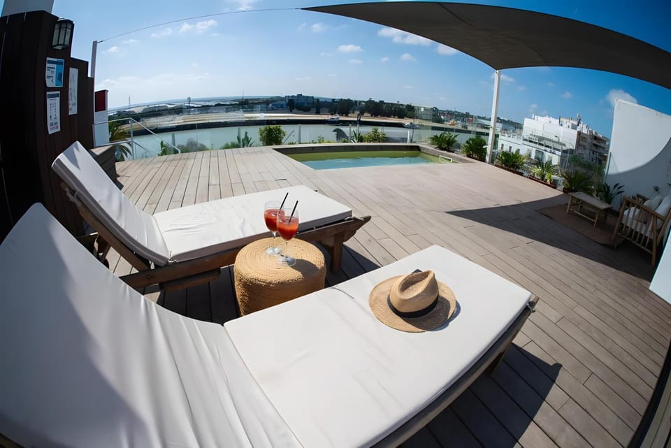 Property building, Living room, Swimming pool
