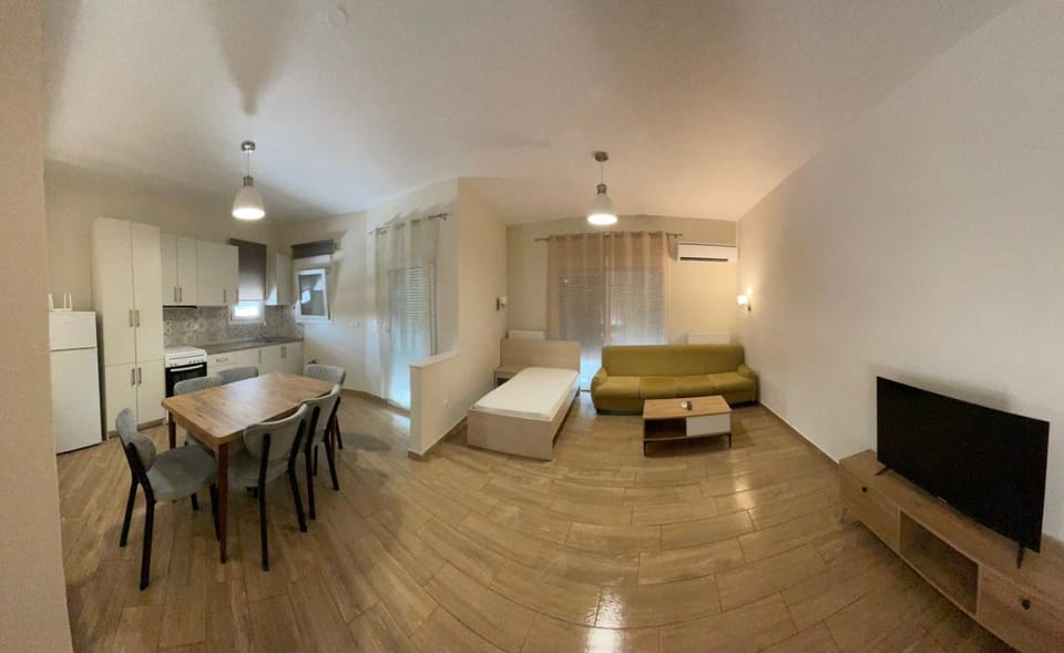 TV and multimedia, Kitchen or kitchenette, Living room, Photo of the whole room, Seating area, Dining area