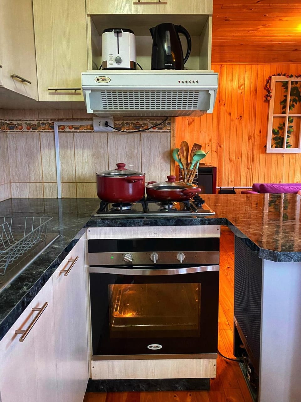 Kitchen or kitchenette, oven, stove