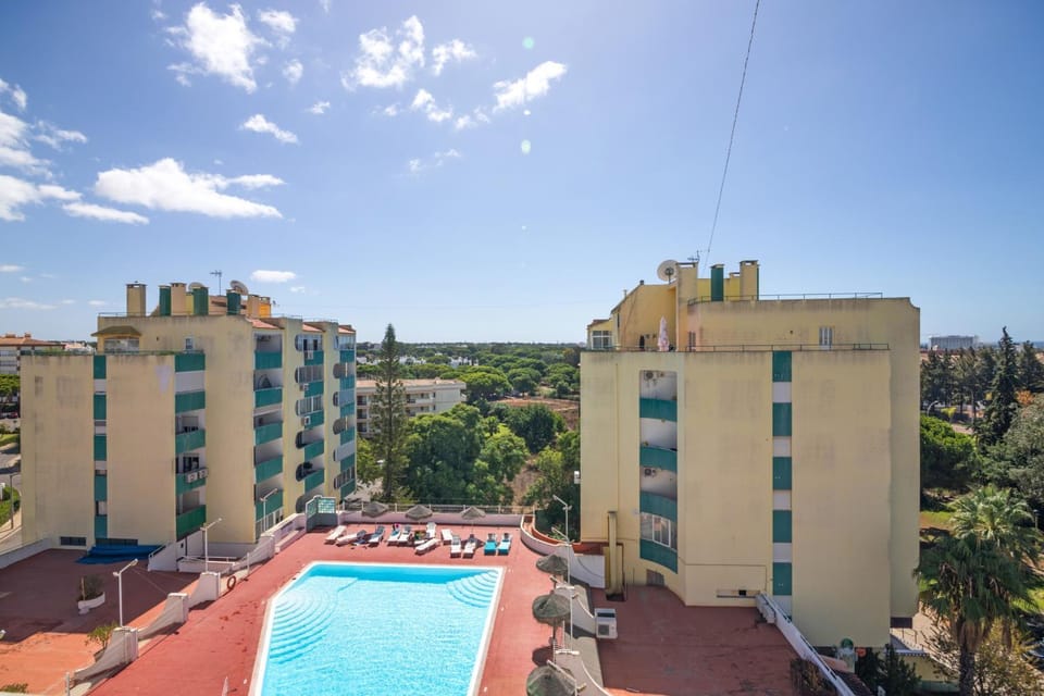 Property building, Living room, Swimming pool
