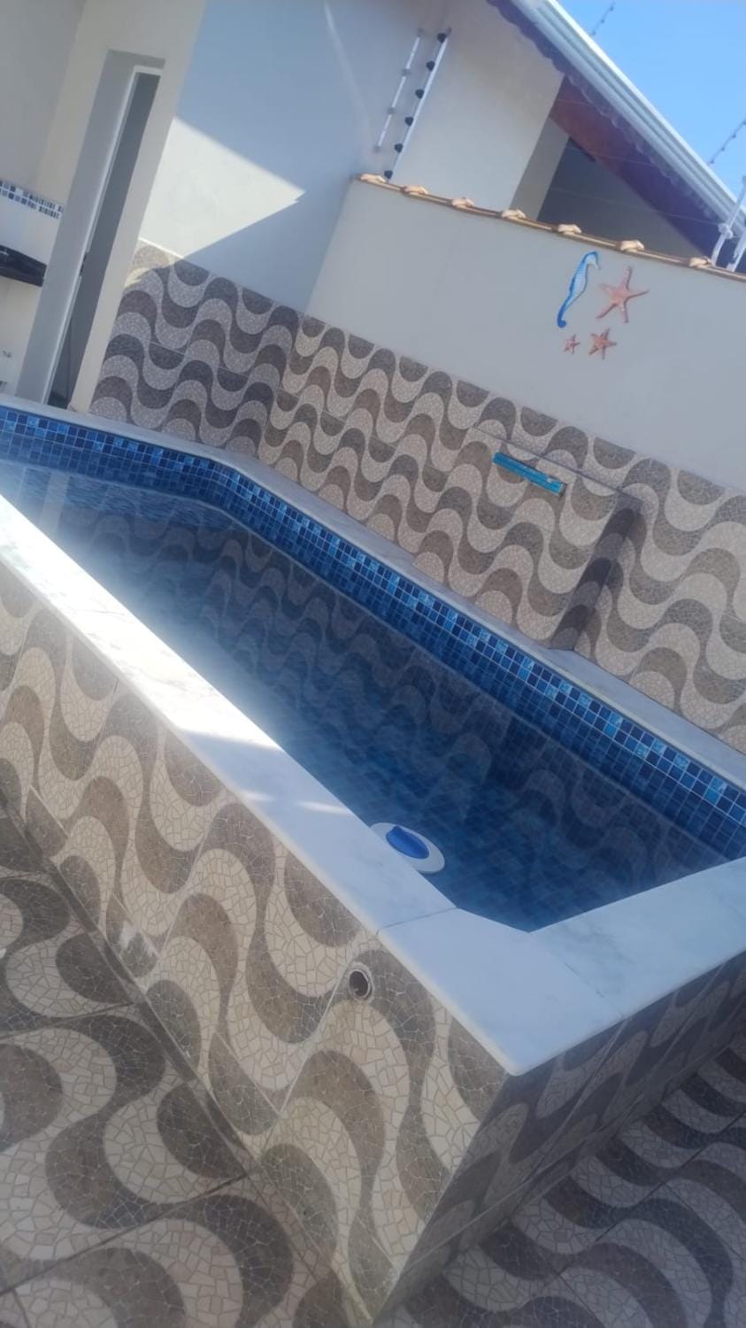 Casa temporada com piscina inteira Itanhaém Briiwa House in Itanhaém