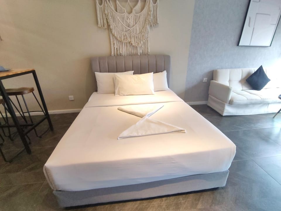 Bed, Living room, Seating area, Bedroom