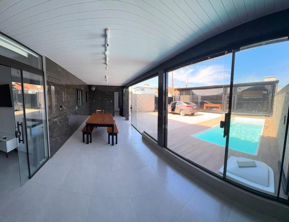 Beach House with Pool near Guarda do Em House in State of Santa Catarina