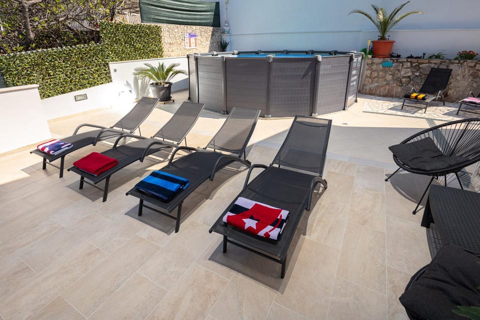 Patio, Pool view, sunbed